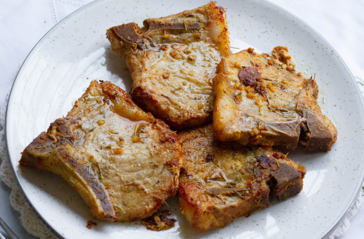 Bisteca de porco frita