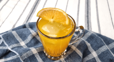 Drink com Skol Beats, gin e laranja