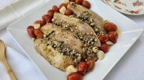 Filé de tilápia com tomate confit e molho de castanha