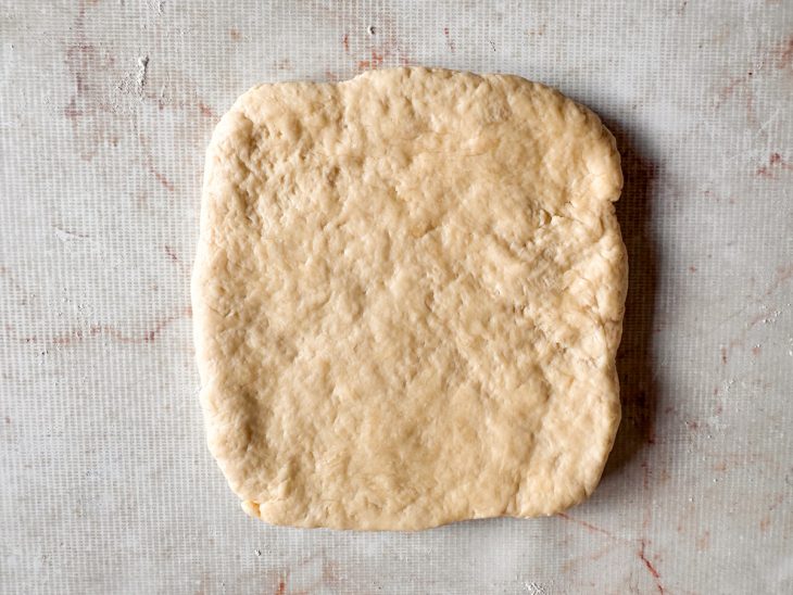 Massa modelada em forma de quadrado.