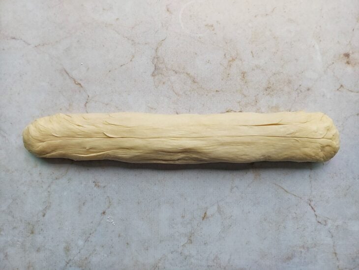 Massa modelada em formado de cilindro.