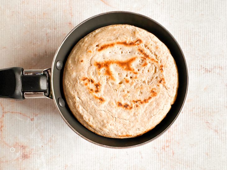 Pão virado após metade do tempo.