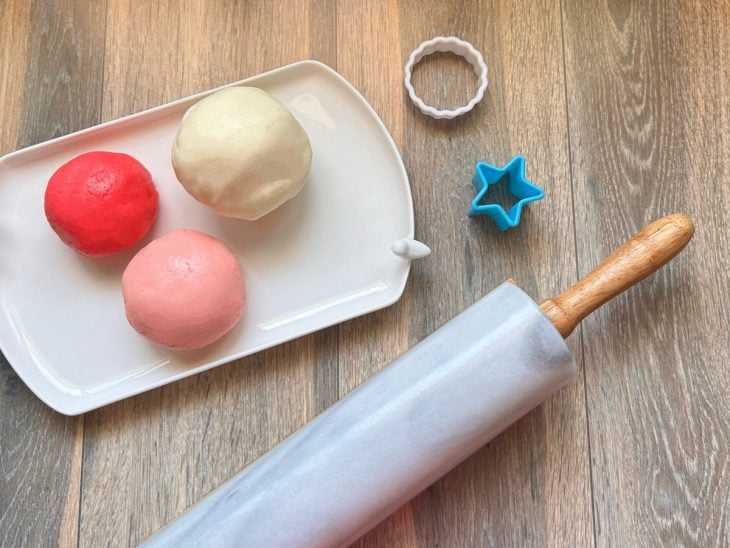Um recipiente com a pasta de leite Ninho sem leite condensado.