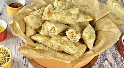 Pastel com recheio de queijo e batata palha