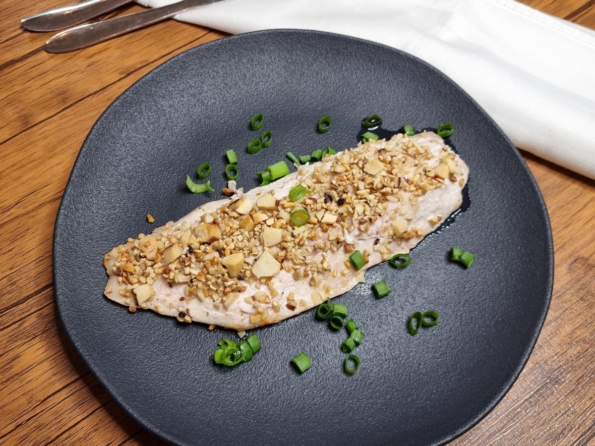 Peixe assado com castanhas