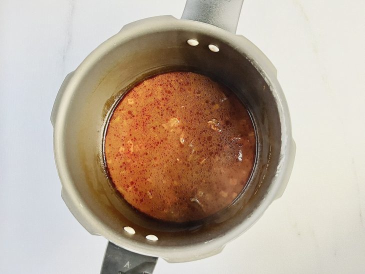 Carne após pegar pressão.