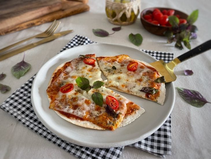 Pizza de marguerita no Rap10 servida.