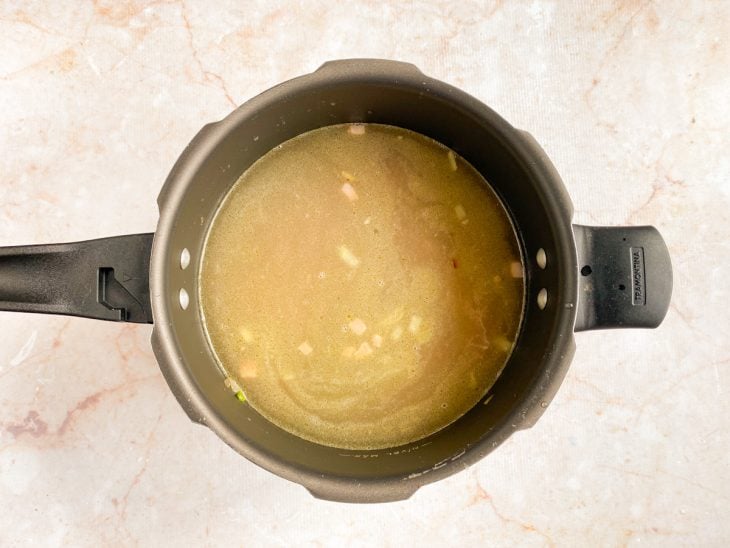 água para cozimento da sopa adicionada.