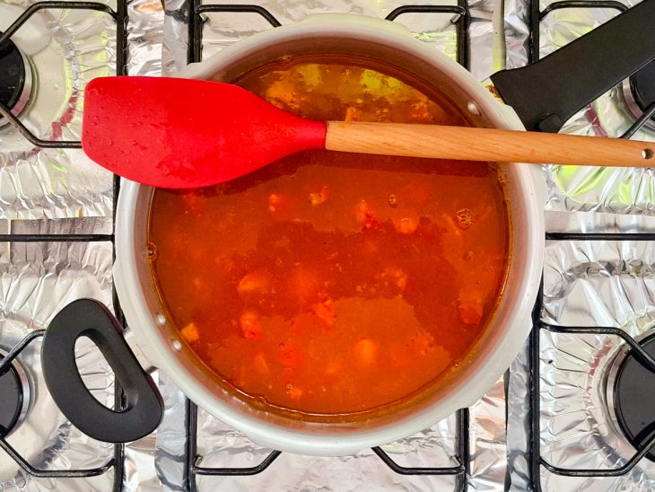 Extrato de tomate adicionado na carne.
