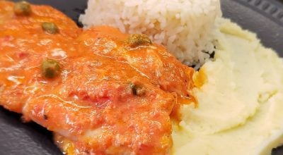 Tilápia ao molho de tomate e leite de coco